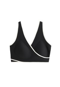 Črn bralet z V-izrezom in mehkimi košaricami. Ima kontrastne bele obrobe ob robovih in gladek, teksturiran material.