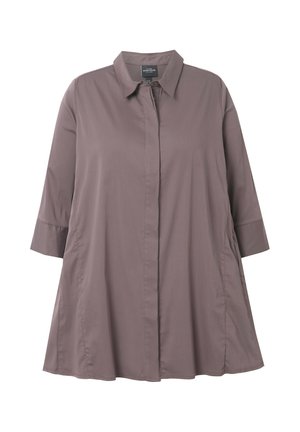 Chemise à manches longues, boutonnée en tissu mauve. Dotée d'un col, d'une coupe ample et d'un ourlet arrondi. Design simple et épuré sans motifs.