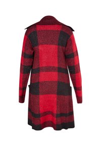 Röd och svart rutigt rock i texturerat tyg, har en krage, lång ärmar och sidofickor. Mittenlängd med en utsvängd nederdel.