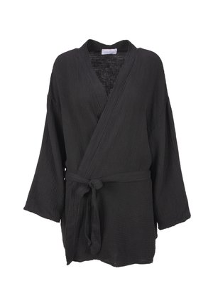 Black, woven wrap top with a v-neck, wide sleeves, and a tied waistband. Textured fabric with a soft, lightweight appearance.