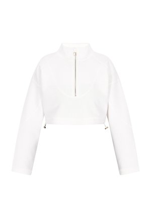 Afklippet hvid sweatshirt med høj krave, lynlås foran og lange ærmer. Har et sømløst design og justerbare sidefeatures.