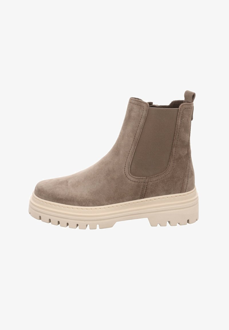 Botín Chelsea de ante marrón con una suela de goma beige gruesa, paneles laterales elásticos y una tira en la parte trasera para facilitar su colocación.