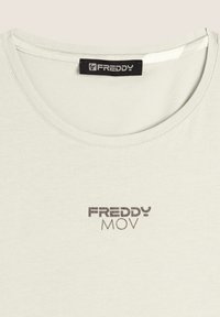 Freddy REGULAR FIT CON APERTURA LATERALE - Top - cannoli cream