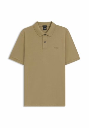 Polo met korte mouwen in kaki. Gemaakt van gestructureerde stof. Voorzien van een kraag en een knoopsluiting met twee knopen. Klein logo op de linkerborst.