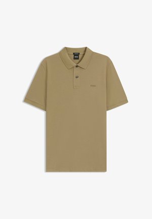 Polo met korte mouwen in kaki. Gemaakt van gestructureerde stof. Voorzien van een kraag en een knoopsluiting met twee knopen. Klein logo op de linkerborst.