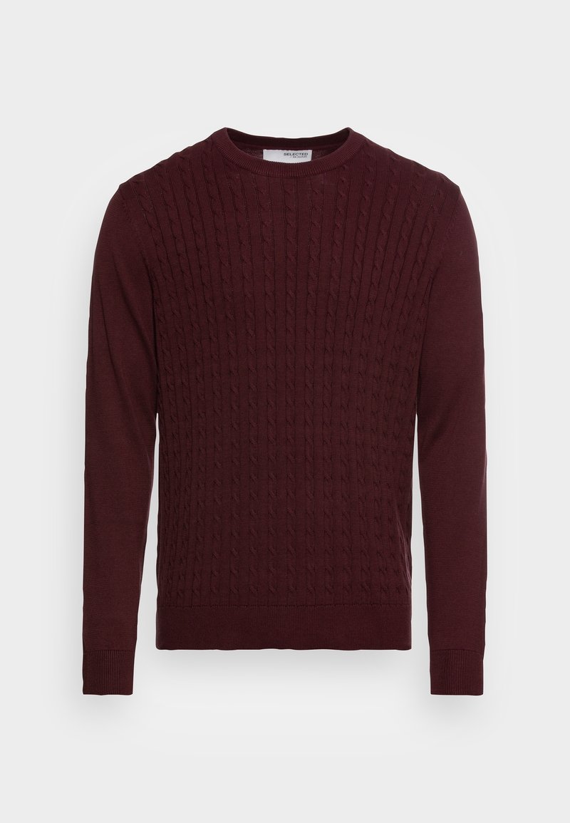 Burgunderfärgad stickad tröja med kabelmönster, rund halsringning och långa ärmar med ribbade mudd och nederkant. Mjuk textur och avspänt design.