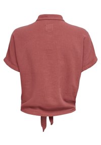Chemise courte à manches courtes rose poudré avec col et détail noué dans le dos.