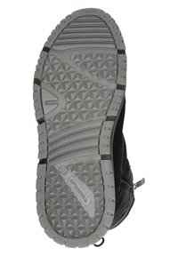 Zwarte laars met een gestructureerde rubberen zool met geometrische patronen, een ritsluiting en een glad bovenmateriaal. Maat gemarkeerd als 37.