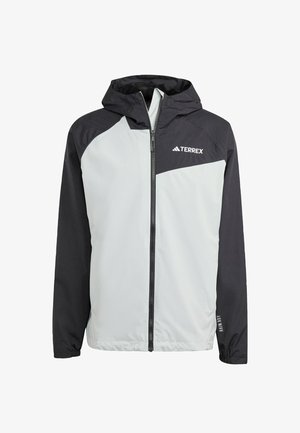 Light gray and black hooded jacket with a zip front, featuring a logo on the chest, elastic cuffs, and a sleek, waterproof material.