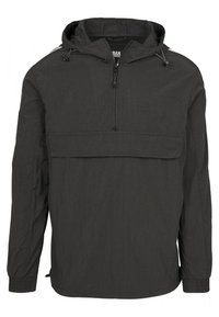Chaqueta de pulóver negra hecha de tejido ligero. Tiene un cierre de media cremallera en la parte delantera, capucha ajustable y un gran bolsillo frontal. Mangas largas.