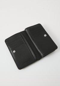 Black leather wallet with a bifold design, featuring multiple card slots, a snap closure, and smooth, textured surfaces.