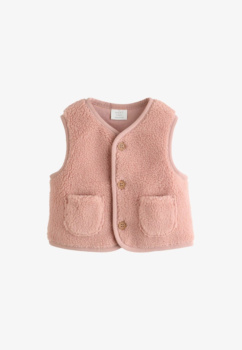 Gilet bébé rose doux avec une texture duveteuse, trois boutons en bois sur le devant et deux petites poches frontales.