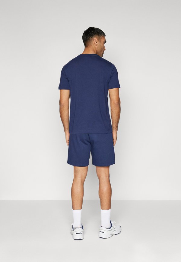 SWEATSHORTS - Sports shorts - peacock3