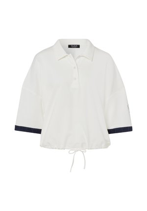 Witte polo met korte mouwen, denimaccenten bij de manchetten en een trekkoord onderaan. Heeft een klassieke kraag en knoopsluiting.
