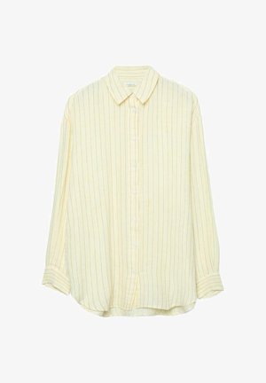 Langærmet, lysegul skjorte med knapper og tynde, lodrette sorte striber samt en spids krave, lagt fladt på en hvid baggrund.