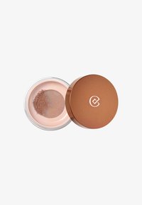 Loose powder foundation with a metallic bronze lid partially open, showing pinkish-beige powder and a fine mesh sifter inside.