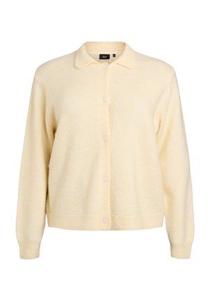 Light yellow cardigan made of soft, textured fabric with a collar, front buttons, and ribbed cuffs. Features a relaxed fit design.