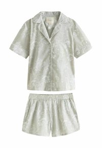 Vaaleanharmaa pyjama-asuste, jossa on lyhythihainen paita ja shortsit. Kukallinen kuvio, napit edessä ja taskudetaili paidassa. Elastinen vyötärö shortsissa.