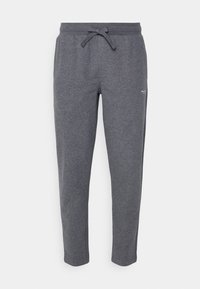 Dunkelgraue Jogginghose mit elastischem Bund und Kordelzug, schmal zulaufenden Beinen und dezenten Seitentaschen.