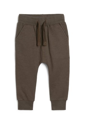 Brune joggingbukser til børn med elastisk linning, snøre, forlommer og ribkanter, vist på en ensfarvet hvid baggrund.