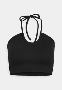 Top cropped preto com riscas, de decote redondo e fecho ajustável nas costas. Apresenta um design justo e sem costuras.