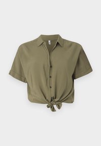 Olive green cropped button-up shirt made of soft fabric, featuring short sleeves, a tie-front detail, and black buttons.