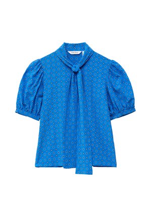 Blouse bleu à manches courtes bouffantes, motif circulaire, avec un nœud à nouer à l'avant du col sur fond blanc.