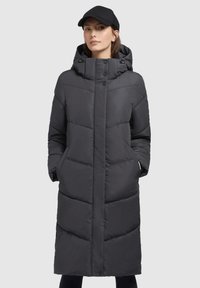 Long puffer coat in dark gray, featuring a hood, side pockets, and quilted design with overlapping panels. Smooth fabric texture.