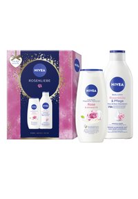 NIVEA ROSENLIEBE gift set with rose and almond oil shower gel and body lotion, white bottles, colorful floral design, decorative box with gold accents.