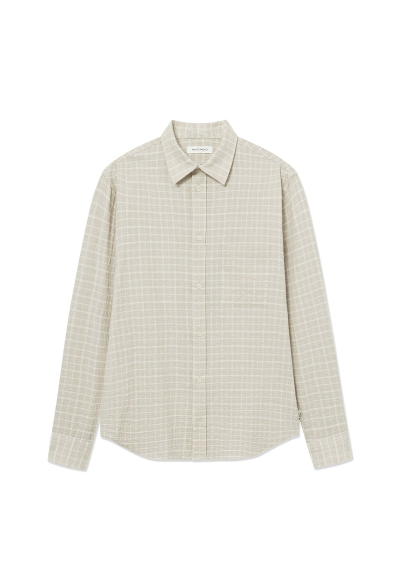Chemise à manches longues beige clair avec un motif à carreaux, col boutonné, poche plaquée à l'avant et un ourlet légèrement arrondi. Tissu texturé.