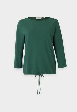 Maglietta verde a maniche lunghe con scollatura rotonda, texture a righe, dettagli con bottoni laterali e cordoncino regolabile all'orlo.