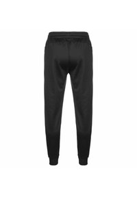 Sorte sweatpants med elastisk talje, tapered ben og ribbede manchetter. Lavet af et glat stof uden synlige logoer eller mønstre.