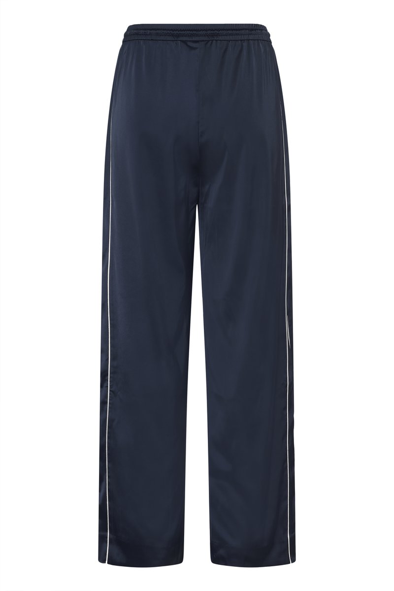 Marineblaue Jogginghose aus leichtem, glattem Material mit weißem Seitenstreifen und elastischem Bund für mehr Komfort.