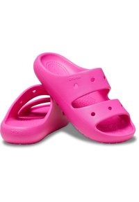 Clogs rosa in stile Crocs con due ampie cinghie, perforazioni per la ventilazione e soletta testurizzata. Realizzati in materiale sintetico leggero e resistente.