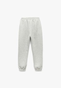 Lys grå sweatpants med elastisk talje og ribbede manchetter. Lavet af blødt materiale, med et minimalistisk design uden lommer.