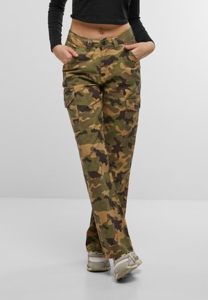 Cargo pants in a camouflage pattern featuring shades of green, brown, and black. Detailed with side pockets and a straight leg design.