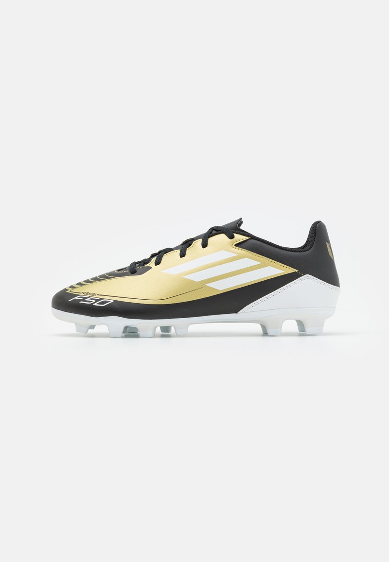 Scarpa da calcio con tomaia sintetica nera e oro, decorata con strisce bianche, design aerodinamico e tacchetti in plastica trasparente per una migliore aderenza.