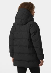 Helly Hansen ELLIE PUFFY PARKA - Abrigo de invierno - black