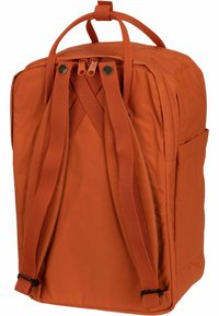 Orange fabric backpack with a rectangular shape, zipper closure, textured straps, and a side pocket for additional storage.