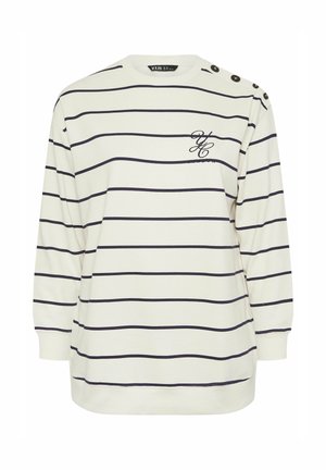 Maglione a maniche lunghe di colore crema con strisce orizzontali blu navy, dotato di un logo sul petto e dettagli con bottoni sulla spalla. Tessuto morbido.