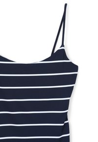Canottiera blu navy con strisce orizzontali bianche, realizzata in materiale elasticizzato, con sottili spalline regolabili e scollatura a giro.
