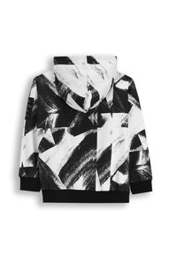 Bluza z kapturem w czarno-białym abstrakcyjnym wzorze pociągnięć pędzla, z czarnymi ściągaczami na dole i przy mankietach, wykonana z miękkiego materiału.