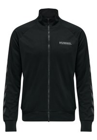 Sort lynlåstrøje i glat stof med høj krave, raglanærmer og grå chevron-detaljer på ærmerne. "HUMMEL"-logo på brystet.