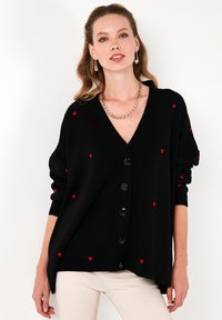 LELA Neuletakki - black