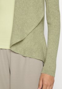 Repeat Casaco de malha - seaweed