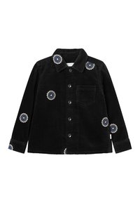 Chemise en velours côtelé noir avec broderie de fleurs bleues et crème, design à boutonner, col, poche poitrine unique et manches à revers.