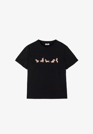 T-shirt en coton noir avec une impression horizontale de différents chiens stylisés en rose clair sur le devant. Col rond classique et manches courtes.