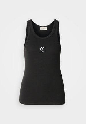 Zwarte tanktop met een geribbelde textuur en een ronde halslijn. Opvallend wit Calvin Klein-logo op de borst. Eenvoudig, aansluitend ontwerp.