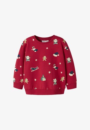 Czerwony sweter z miękkiego materiału, zdobiony wzorami związanymi z świętami, takimi jak Święty Mikołaj, pierniczki, cukierki w kształcie lasek oraz gwiazdki.