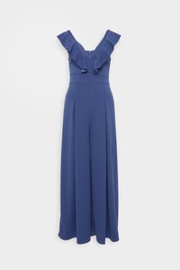 Μπλε, αμάνικο ολόσωμο φόρεμα με βολάν στο V-decollete, πλισέ μέση και φαρδιά πόδια. Φτιαγμένο από ένα λείο, ελαστικό ύφασμα.